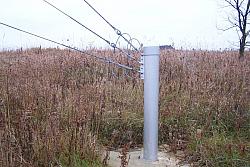 I painted the guy posts with silver colored Rustoleum and put a 6 inch PVC cap on the top to keep the water out.
