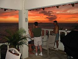 (L-R) Cindy, Scott and Geoff watching cruise ship at sunset.