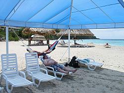 Mike and Chad taking a snooze, at the Sunset Waters Beach Resort.